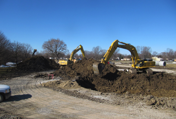 Pamar excavators grading along a roadway